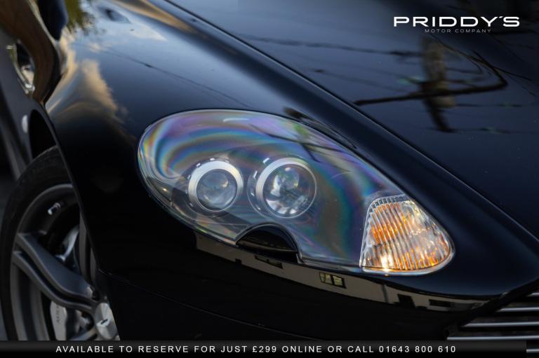 ASTON MARTIN DB9 5.9 - 13 Stamp service portfolio - Future classic by Aston