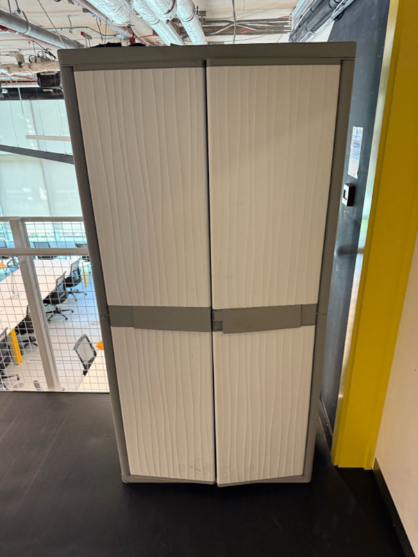 Standing long grey storage cabinet