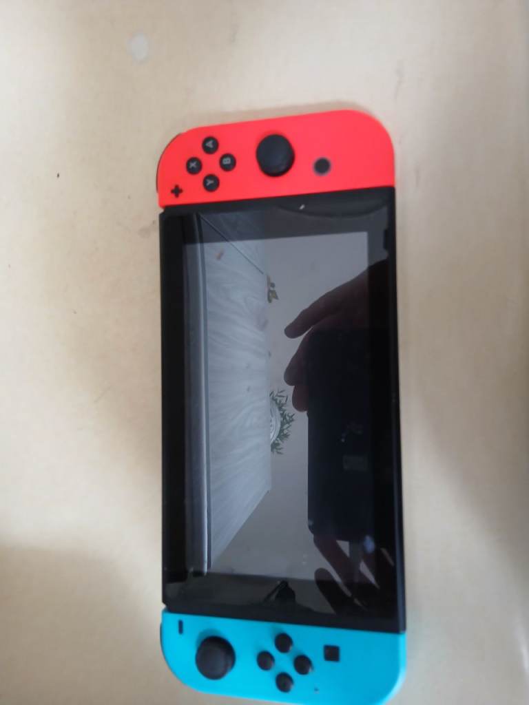 Nintendo Switch Console with Red and Blue Joy-Cons – Fair Condition