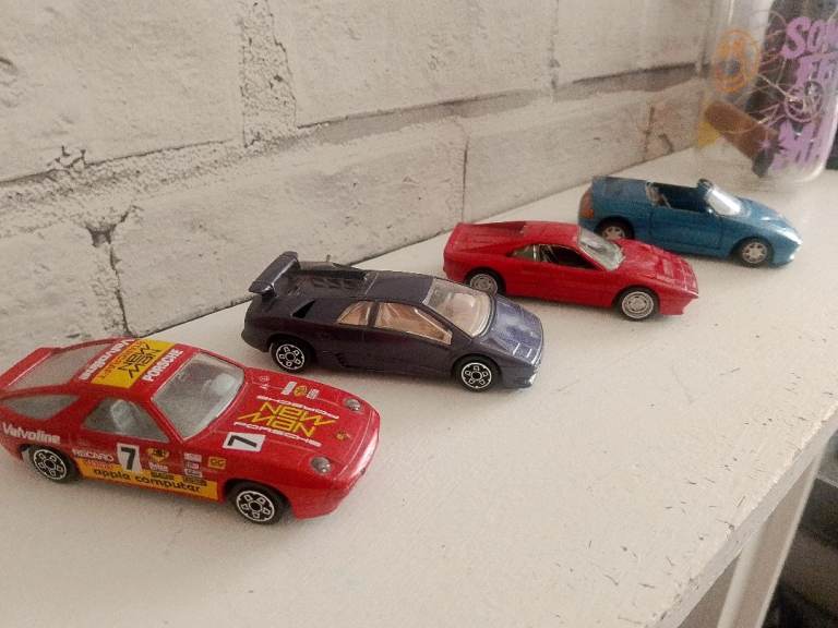 Set of 4 Die-Cast Model Cars – Good Condition