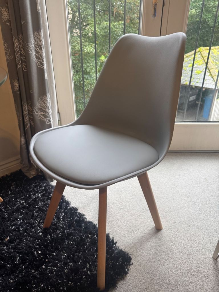 As new set of 4 dining chairs