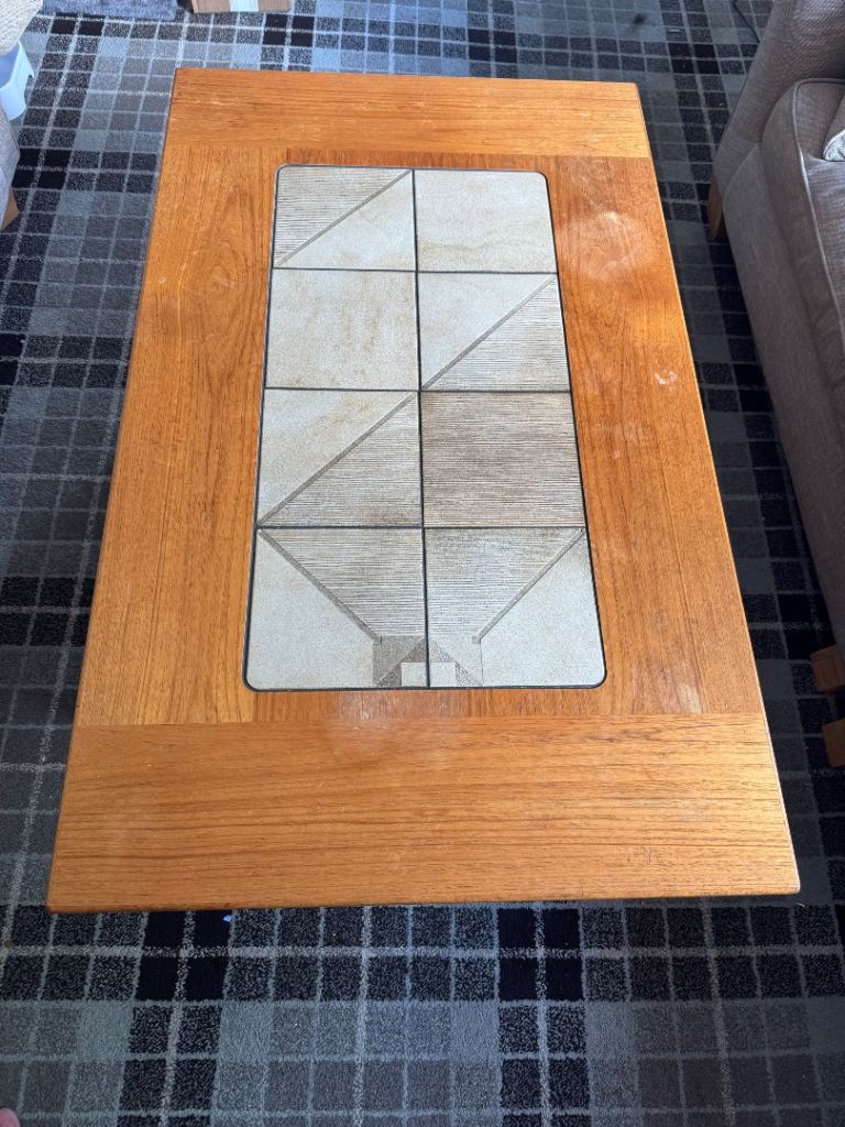 Large wooden coffee table with centre tiles