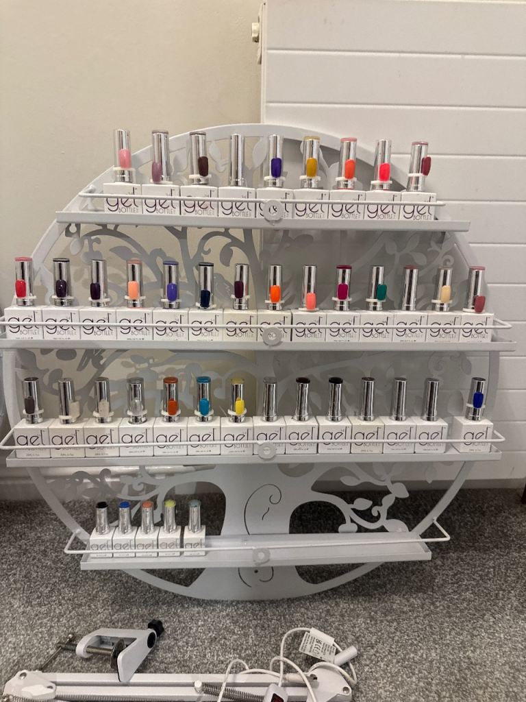 Assorted gel nail polishes and Acrylic tips  