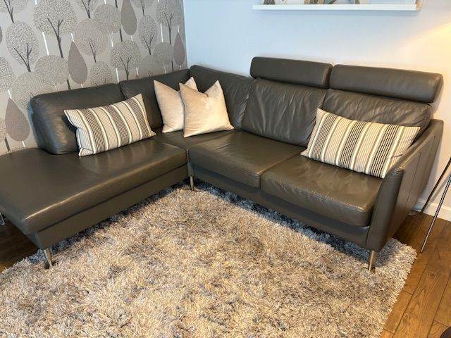  BoConcept Indivi 2 designer corner sofa in premium Salto grey leather with brushed steel legs.