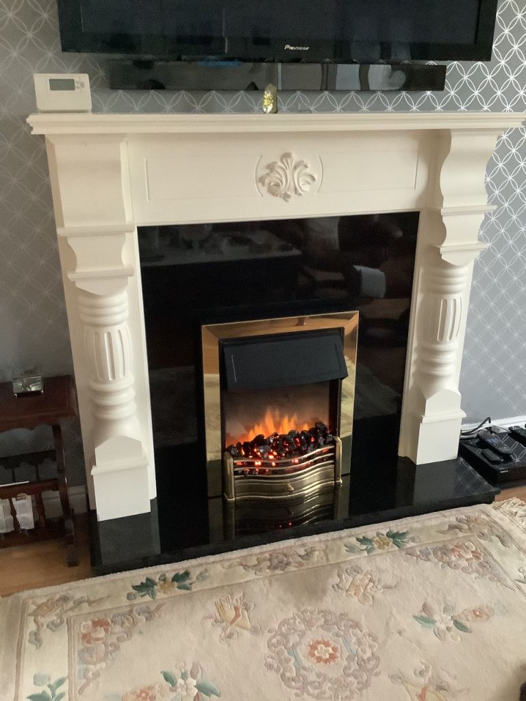 SELLING SEPARATELY. Flame Effect Fire, Fire Surround, Stone Hearth and Back.