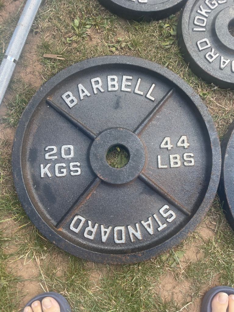 Weight Bench, Barbell, and Weight Plates – Fair Condition
