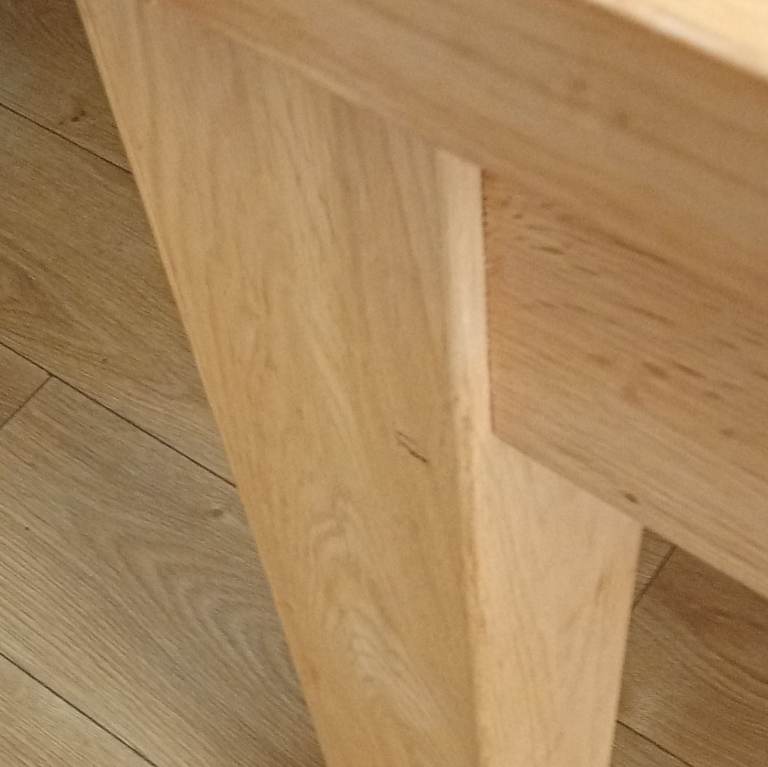 Solid oak dining table and six chairs 