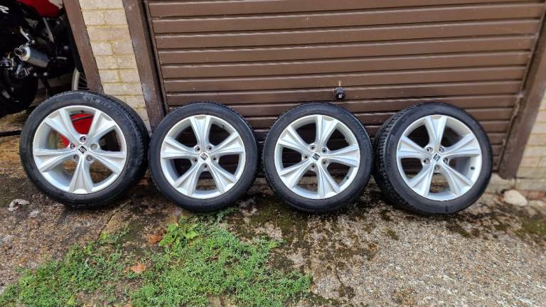 seat leon 17inch genuine alloys with michelin tyres and set of nuts and locks