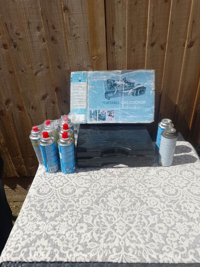 Portable camping gas stove and cannisters 