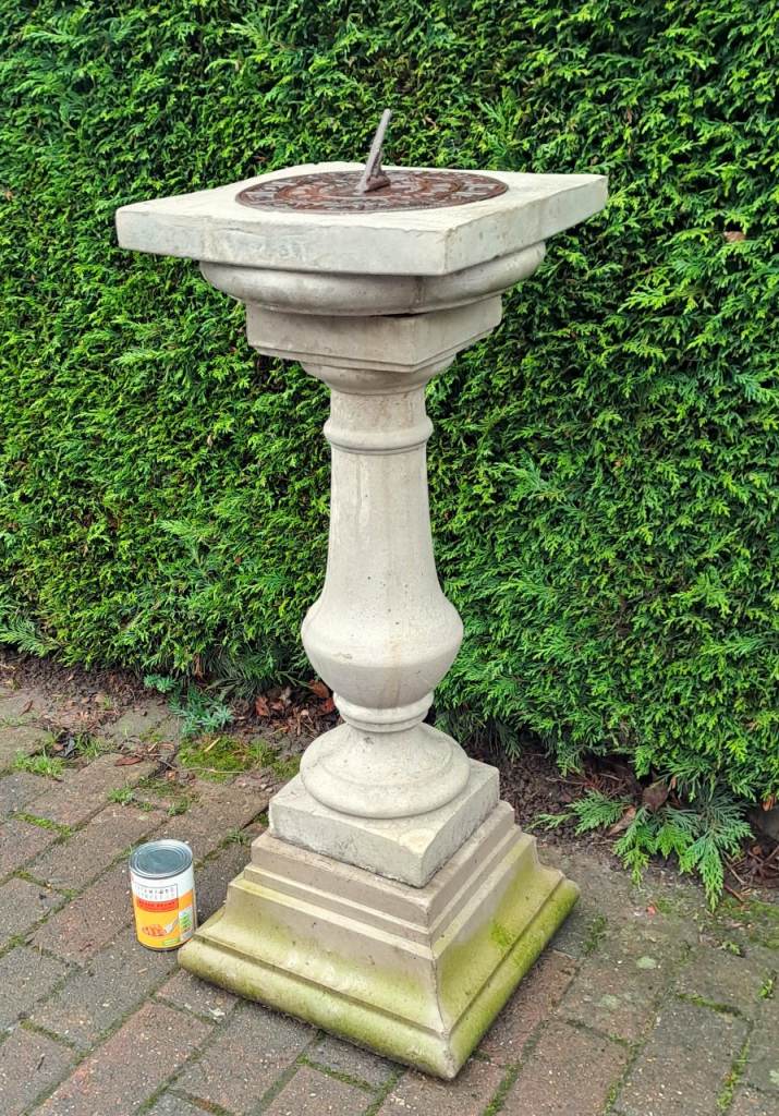 large stone and cast iron garden sundial