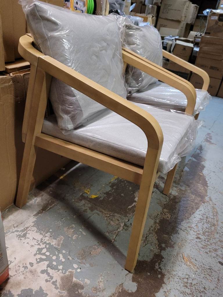 A new pair of wooden garden arm chairs ( one is a slight seconds) with woven rope .