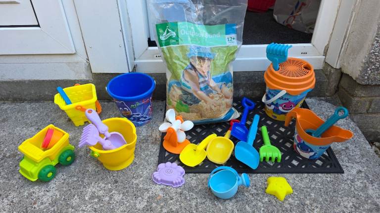 Kids play sand with buckets & spades and more toys 