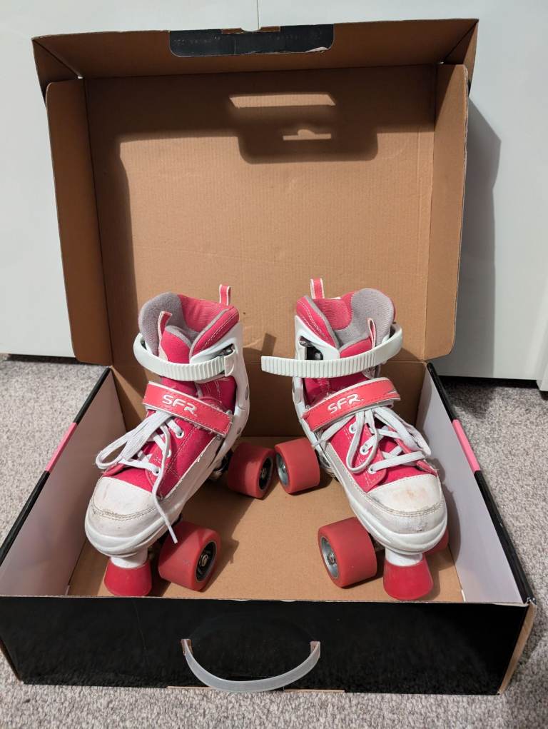 Adjustable quad rollerskates size 12-2