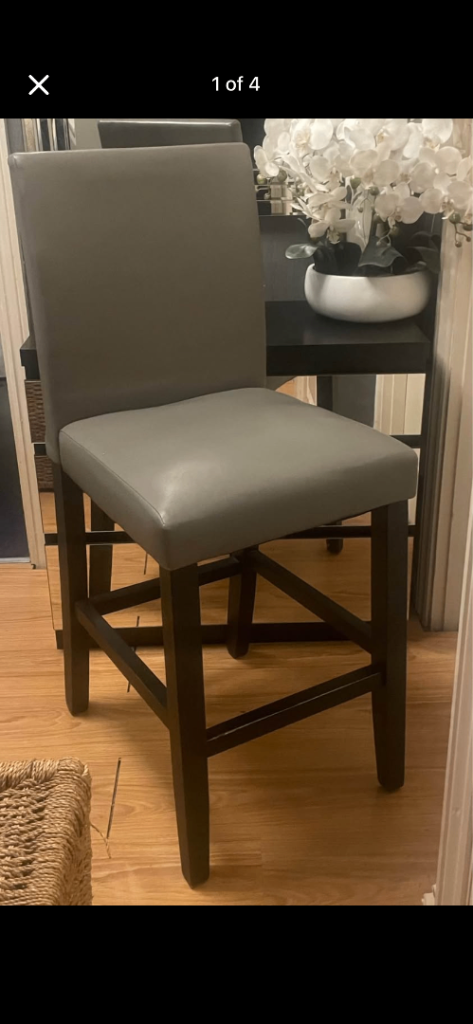 3 Grey bar stools with black legs 