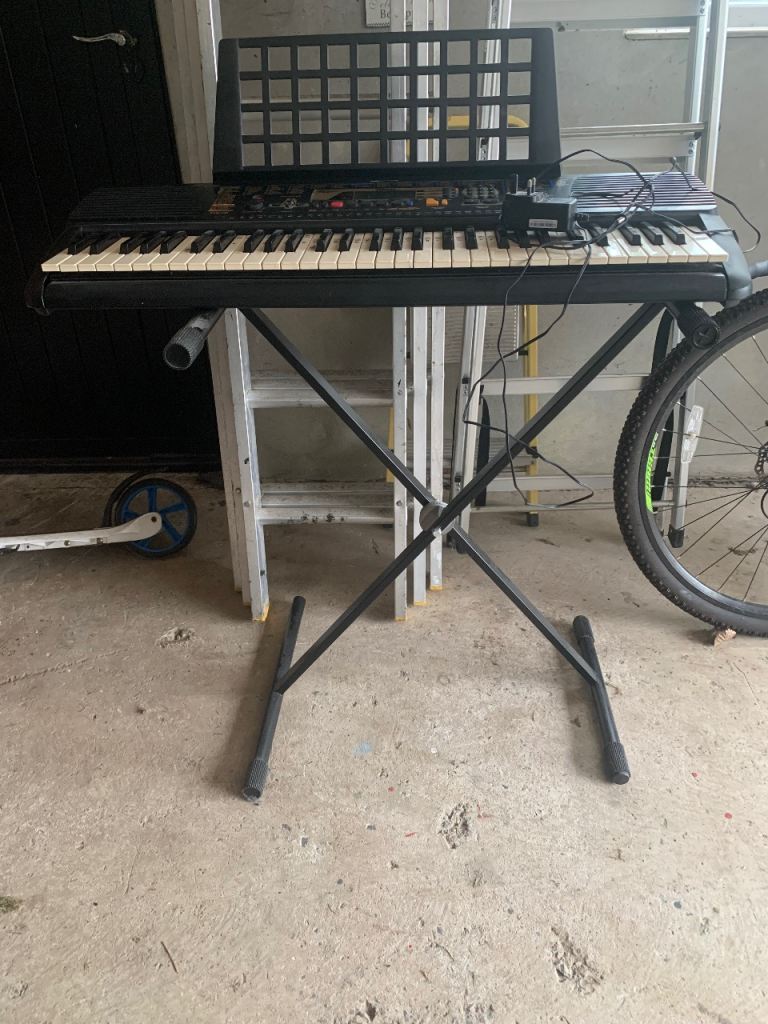 Yamaha Portable Grand Electric Keyboard with Stand – Good Condition