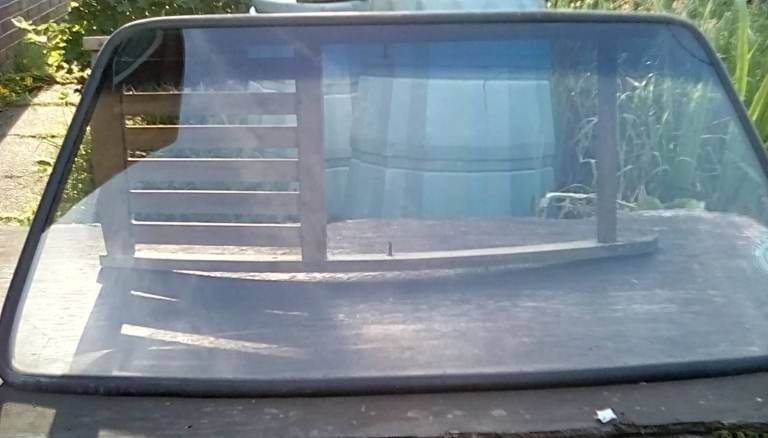 VAUXHALL NOVA 1.3 SR WINDSCREEN AND RUBBER SURROUND EX 1987 D REG