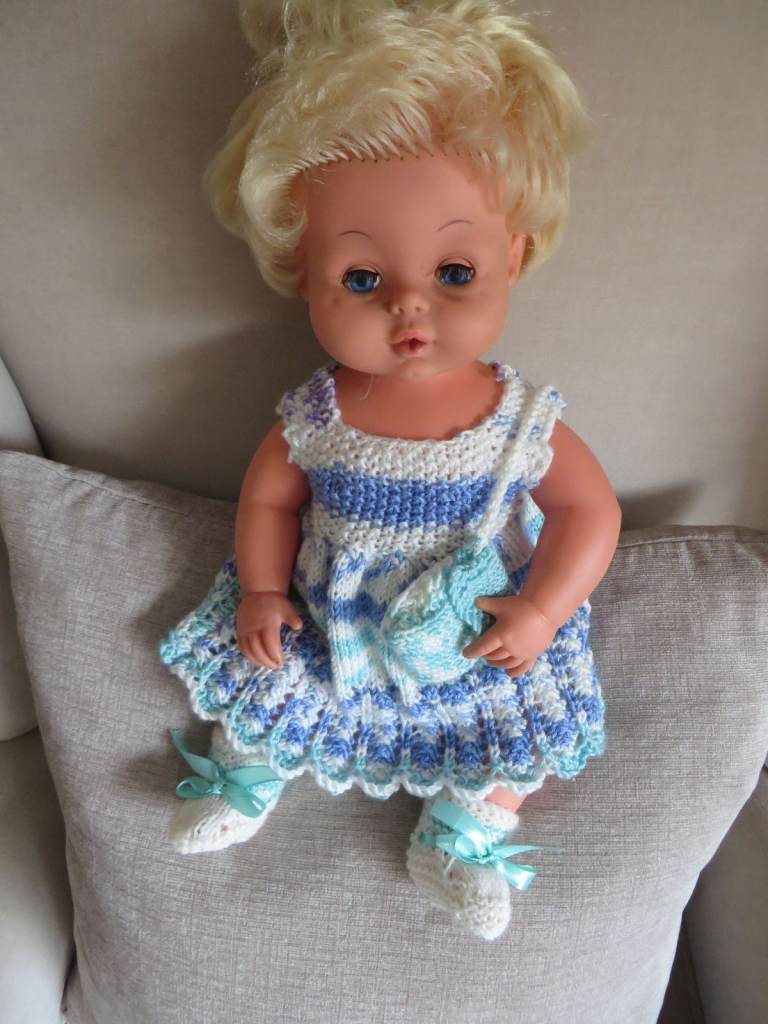 original tiny tears doll with  a new dress/bag/bootees/knickers