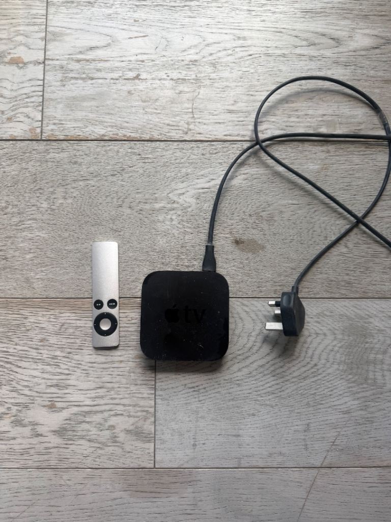 Apple TV Box with Remote and Power Cable – Good Condition