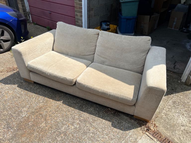 Comfortable Beige Two-Seater Sofa – Good Condition