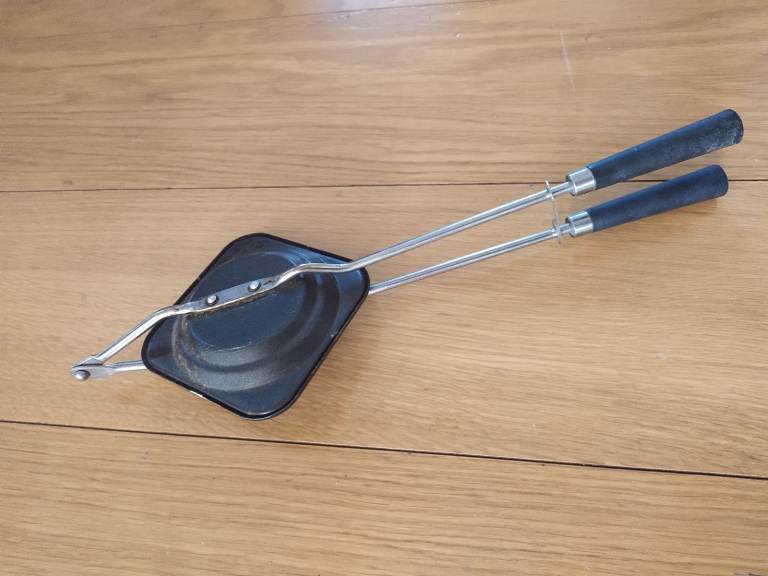 Small, handheld sandwich maker.