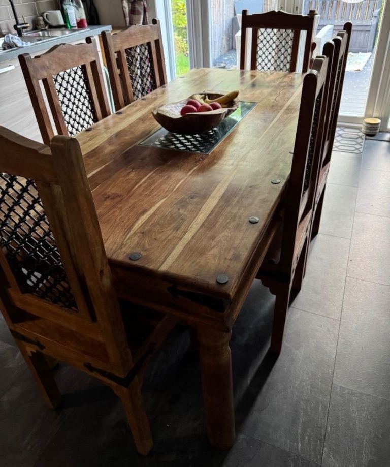 Solid wood dining table and six matching chairs