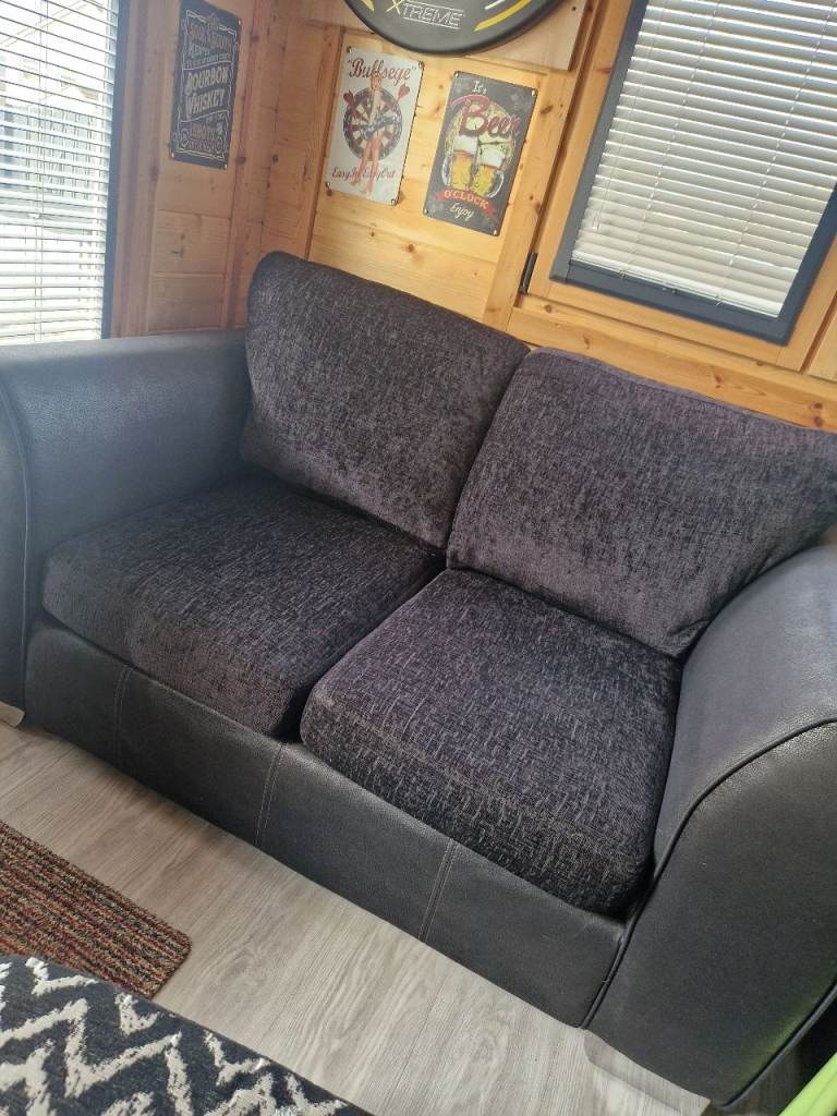 Black DFS two seater sofa