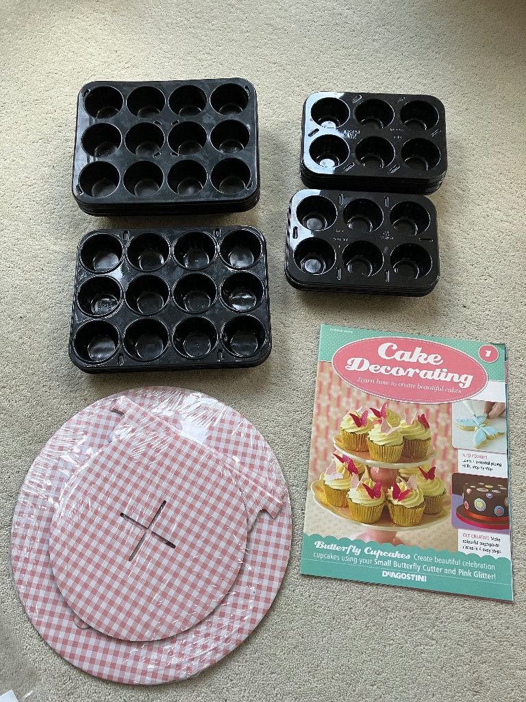 Baking: Mini cupcake trays, Cake decorating booklet and 2 tier cupcake stand. 