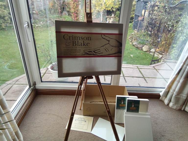 Artist paints kit with easel oil paints, brushes and canvases etc.