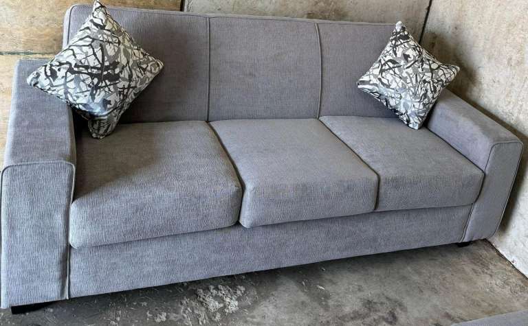 Grey Fabric Three-Seater Sofa – Good Condition