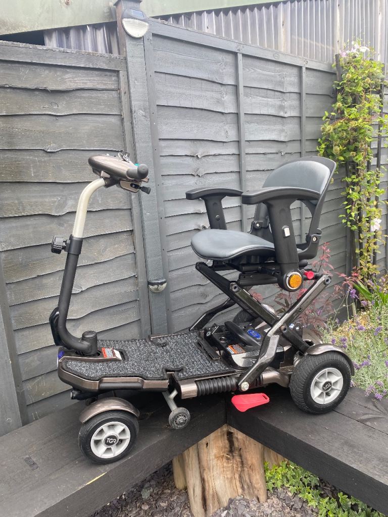 image for RRP £3000 TGA MINIMO PLUS 4 FOLDING MOBILITY SCOOTER