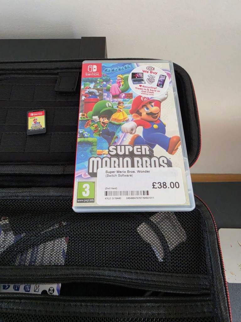 Nintendo Switch Console with Super Mario Bros Game & Case