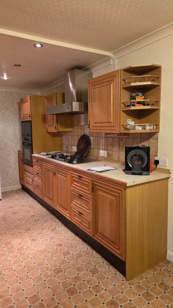 Hardwood Kitchen units and worktop and appliances.