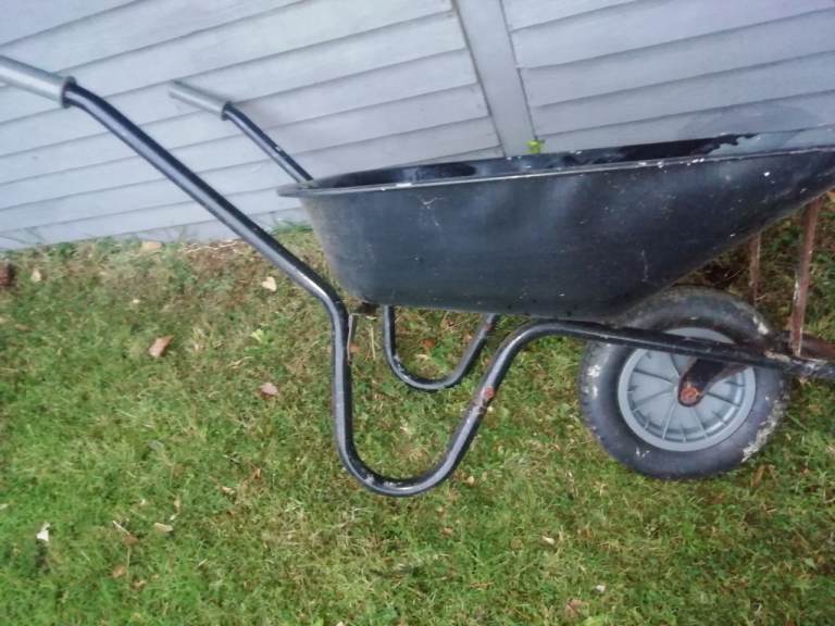 Black Wheelbarrow – Good Condition, Ready for Garden Work