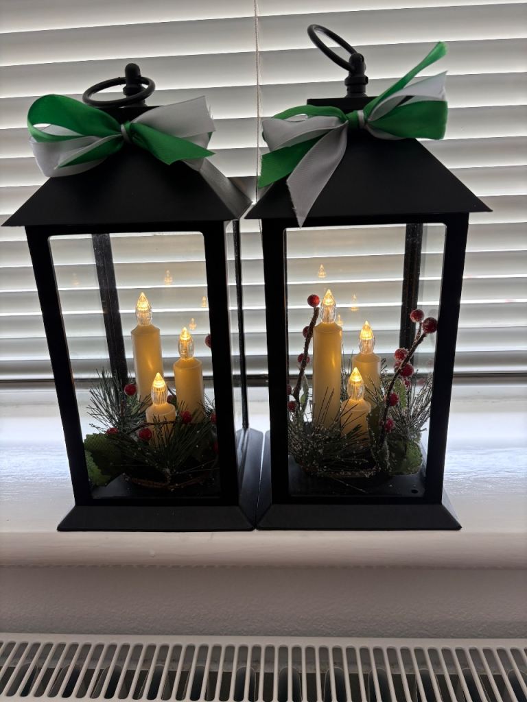2 black Christmas lanterns