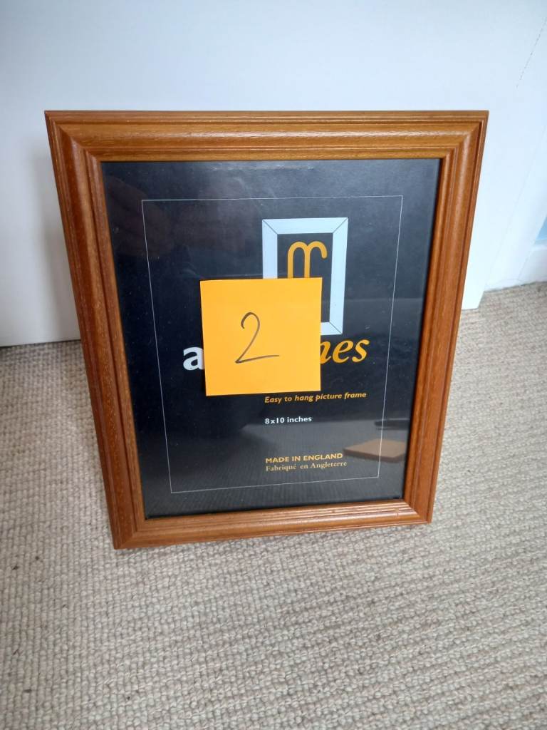 Job lot of 24 picture frames various sizes ranging from small to large.