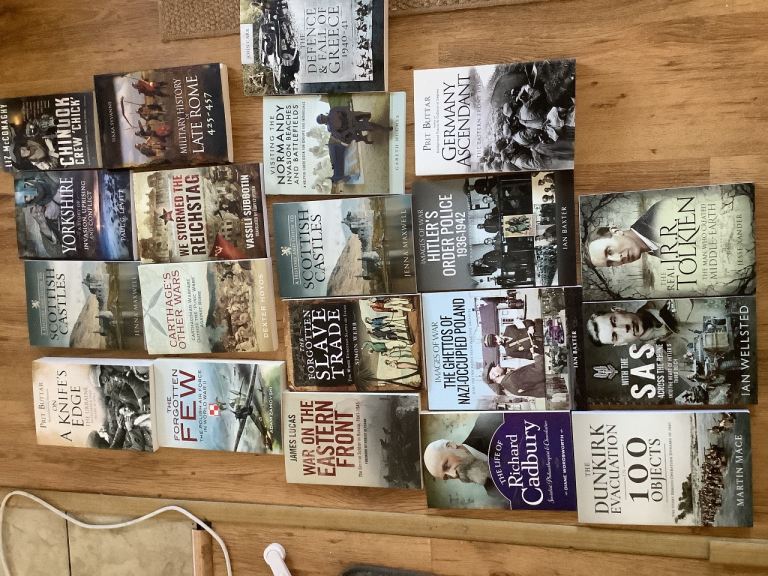 A selection of brand new books. History,war and more