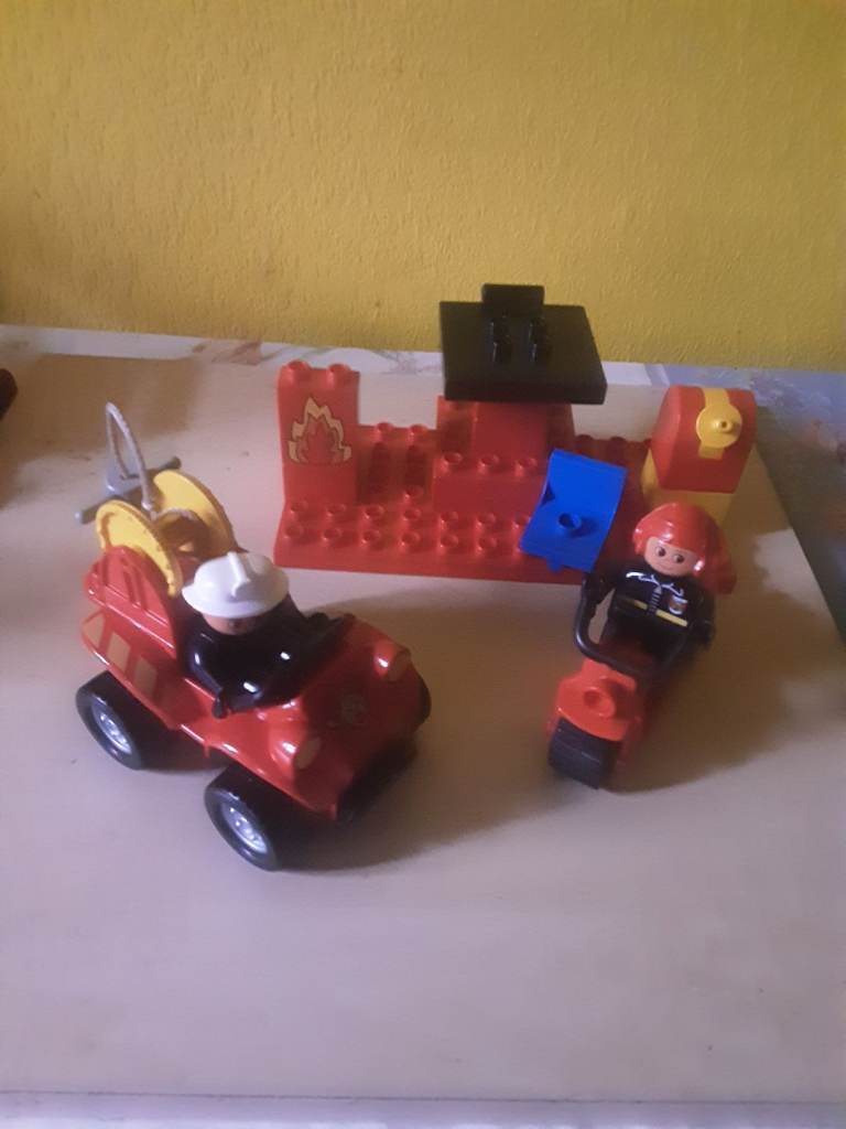 Duplo lego  fire station with fire engine  .Two fire fighter's. Fire motor bike  etc.