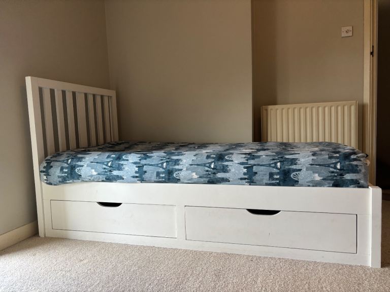 Single white storage wooden bed from feather and black 