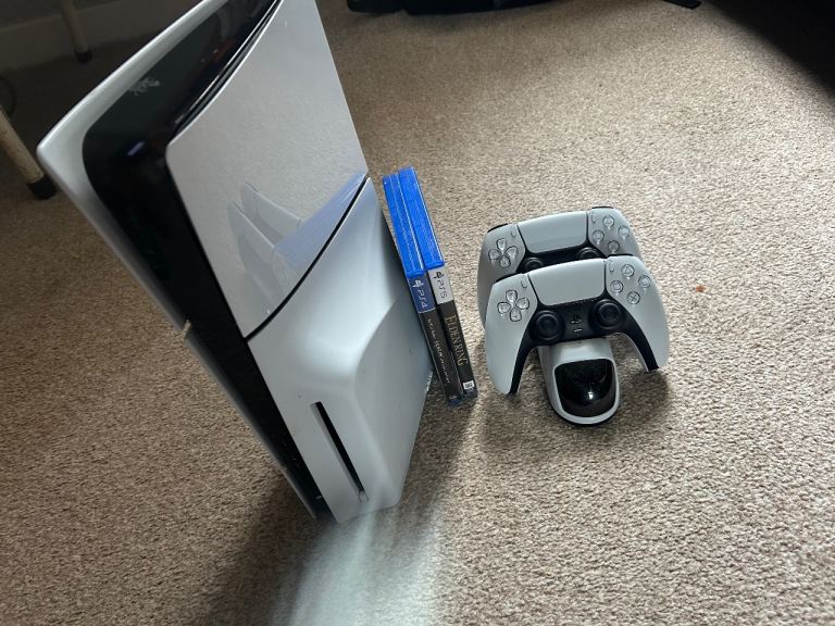 Sony PlayStation 5 Console with Two Controllers and Games