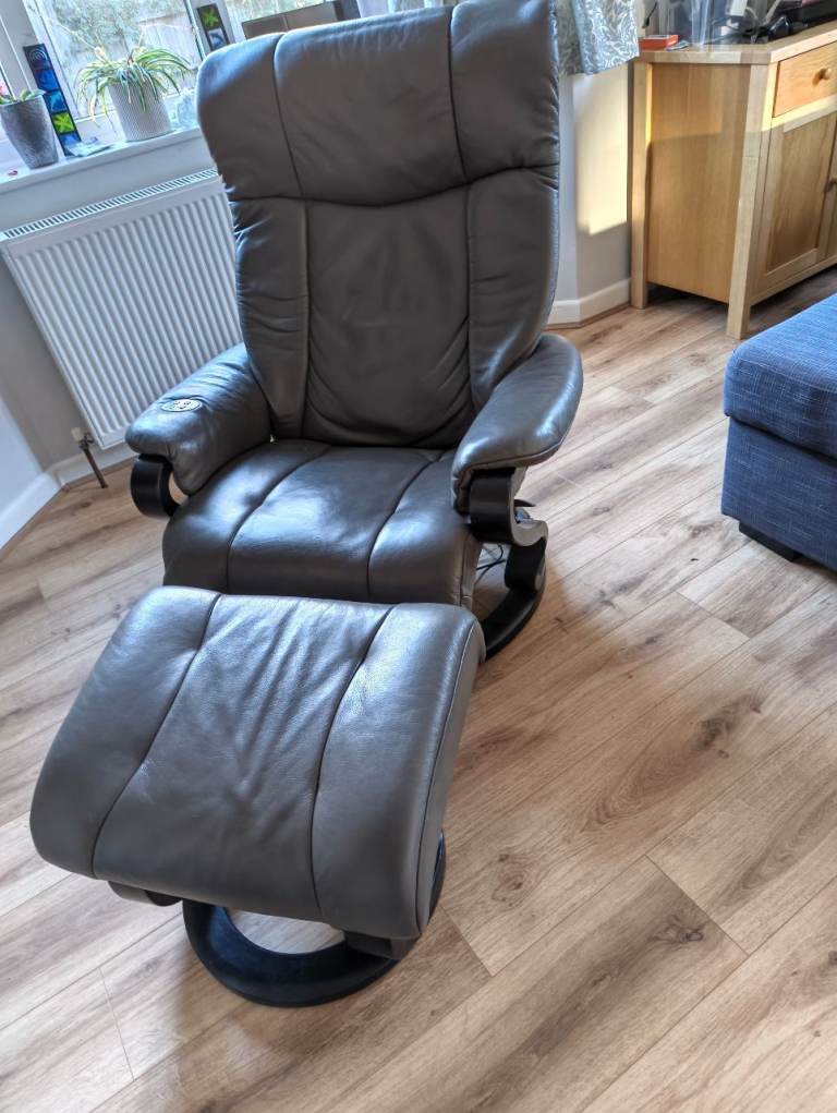 Himolla leather electric massage chair and stool 