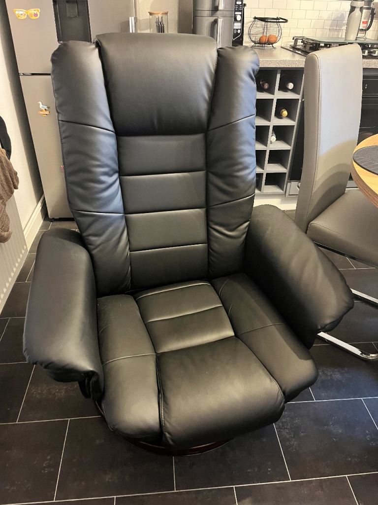 Black relying, swivel chair