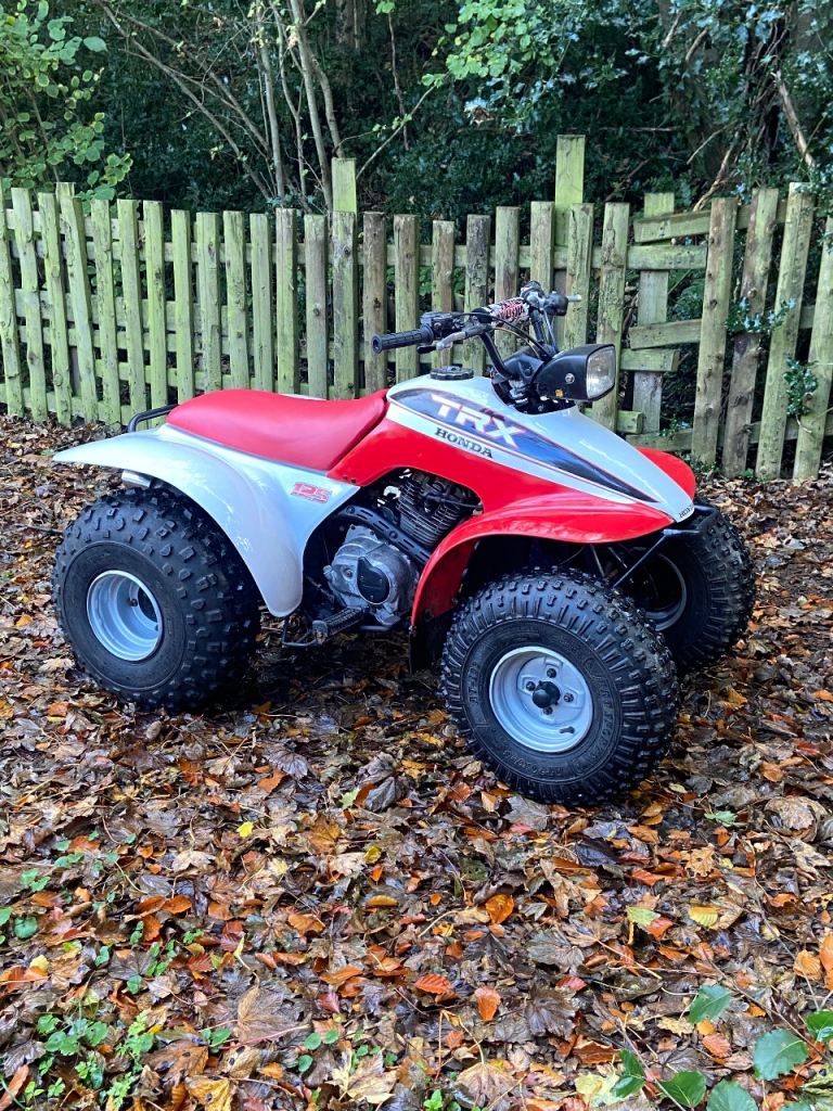 Honda trx 125 quad big red 
