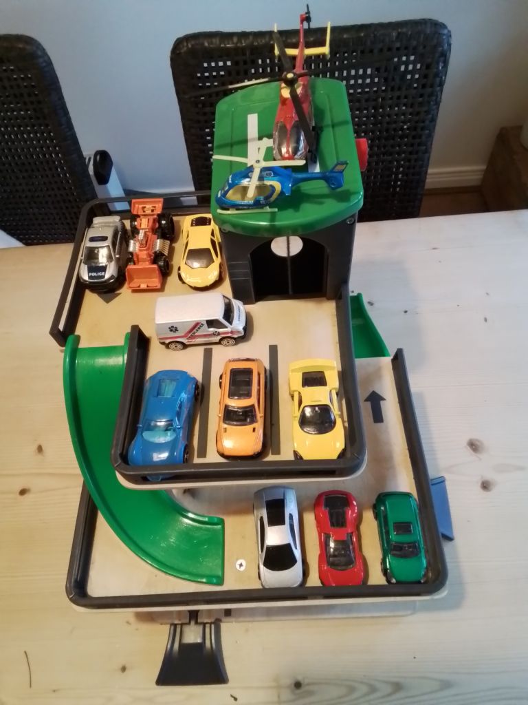 Child's wooden park and ride garage with fully working lift.