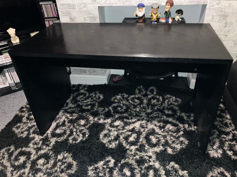 Desk in black wood can deliver for a small charge