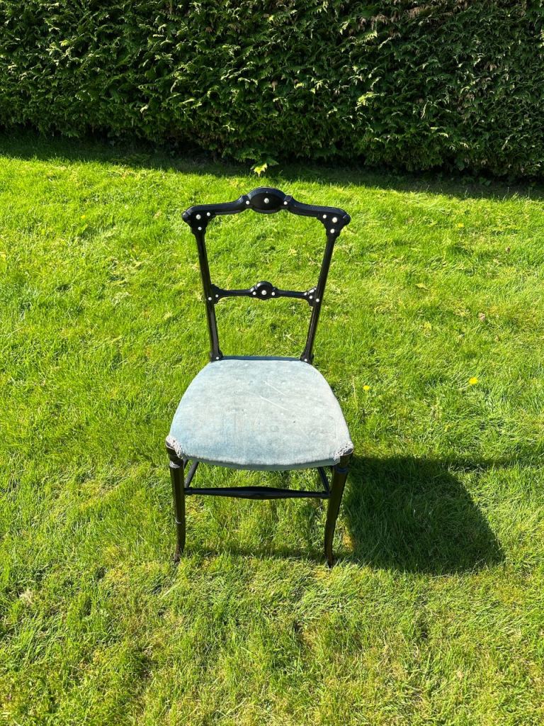 Two antique spindle chairs