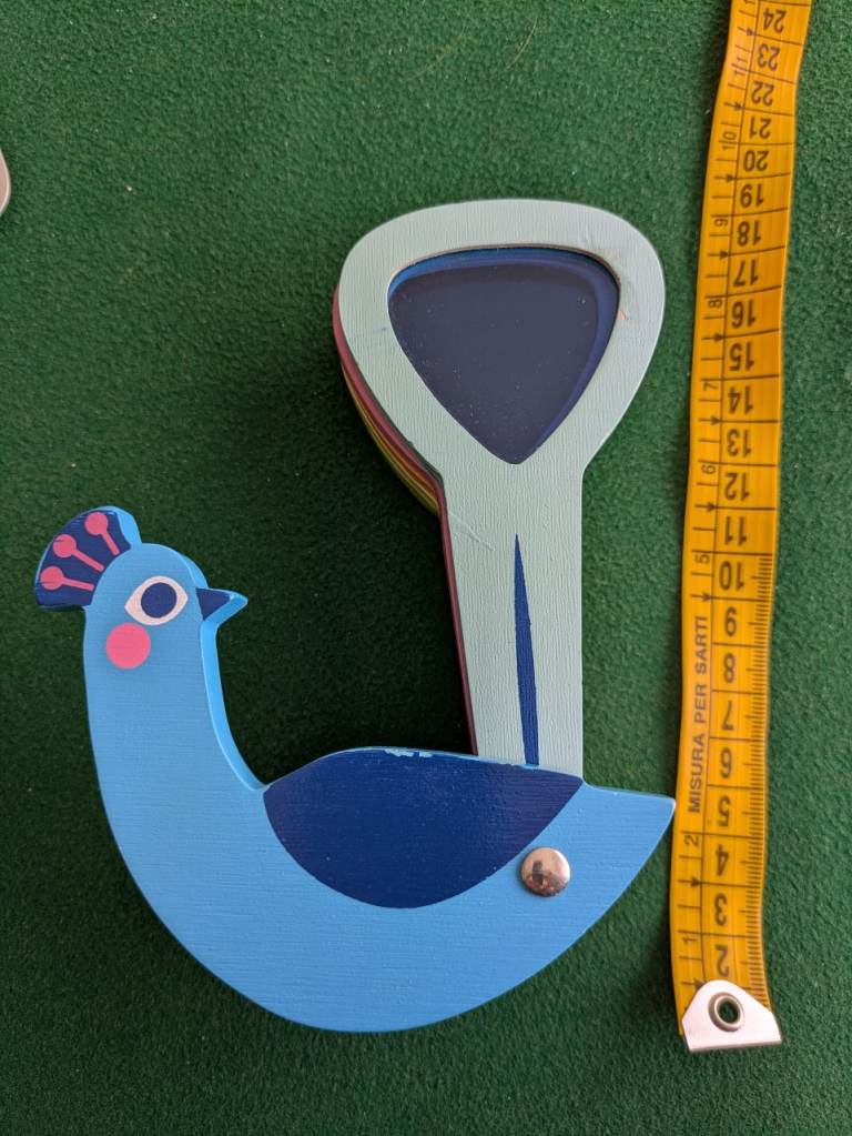 PEACOCK WITH 5 MOVABLE COLORED MASKS