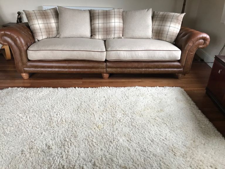 Comfortable Brown Leather Sofa with Cushions – Good Condition
