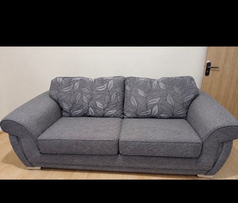 Can Deliver Grey Fabric Two-Seater Sofa – Good Condition