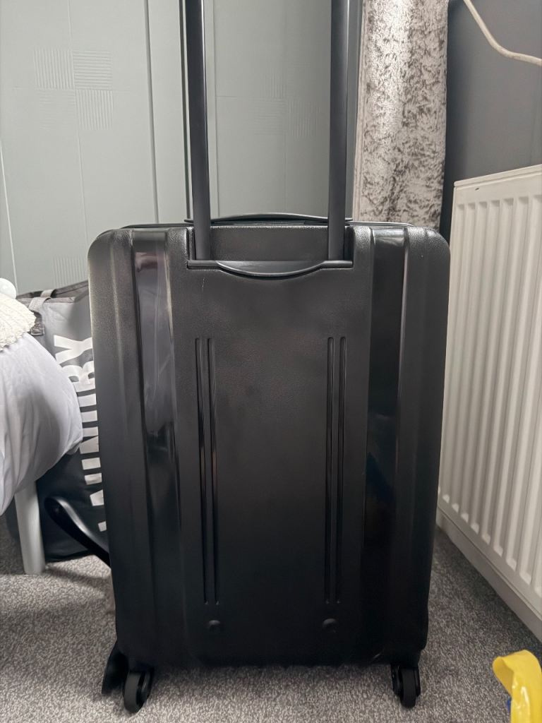 Tripp Black Suitcase - Good Condition, Medium Size