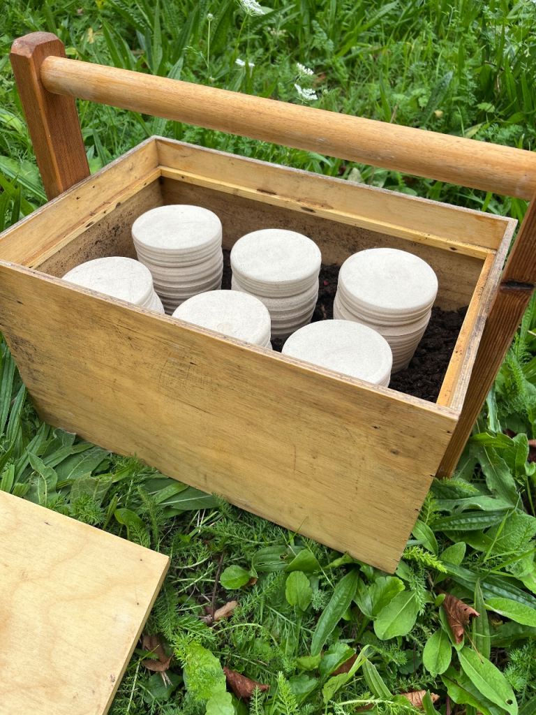 Hand made wooden garden container and hand thrown ceramic jars for storing biodynamic preparations